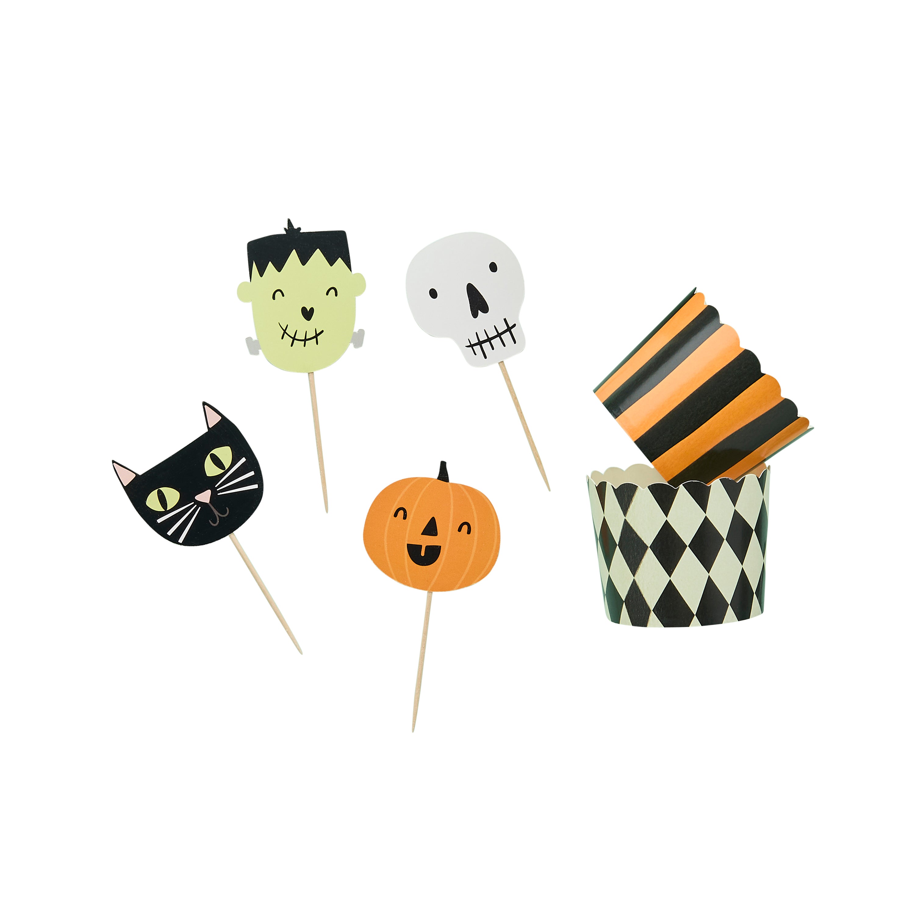 Halloween-themed cupcake toppers including a cat, pumpkin, skull, and frankinstine on sticks.