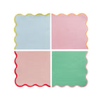 Colour napkins with wavy scalloped edge on a white background
