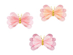 A set of 3 tissue paper butterflies in soft, pastel colors, perfect for decorating a fairytale or garden-themed party.