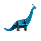  A dinosaur-themed treat stand, perfect for serving sweets at a Dino-themed party.
