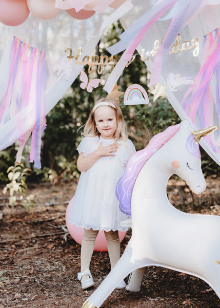 Fairytale Magic unicorn balloon styled at princess themed party celebration