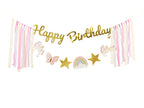 A pastel “Happy Birthday” banner adorned with stars and fairytale elements.