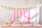 Beige pink felt Happy Birthday banner styled with floral party theme
