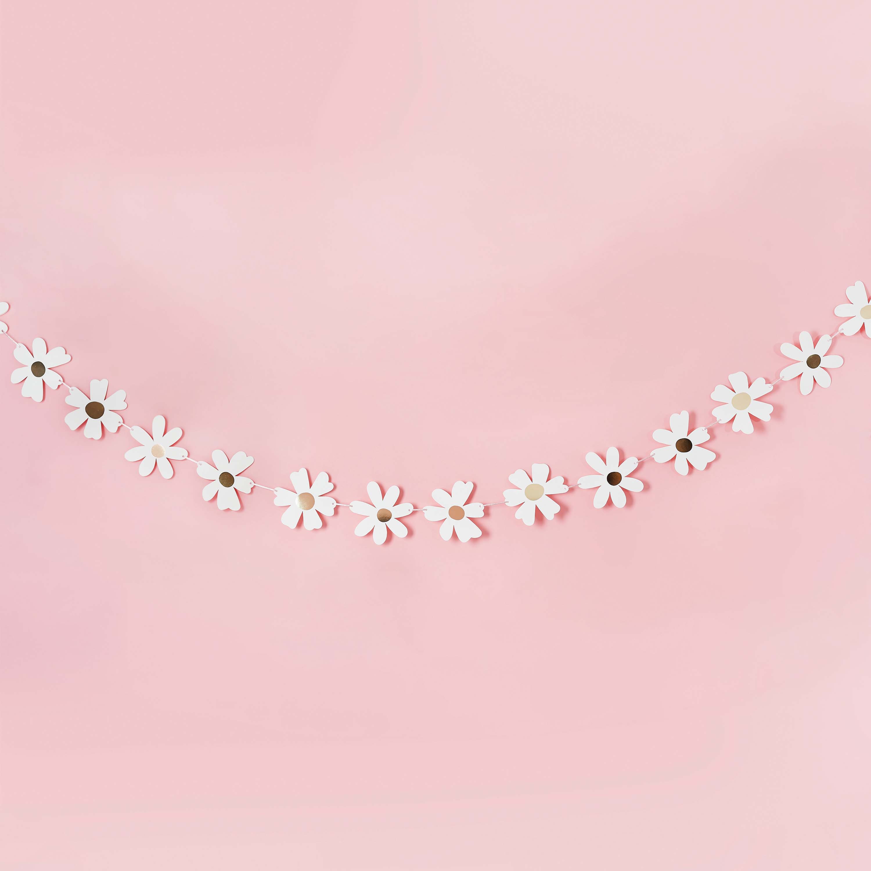 Daisy Days floral garland detail showing daisy-shaped paper cutouts on string