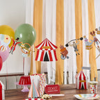 Big Top Circus extravaganza banner styled at colorful circus themed party