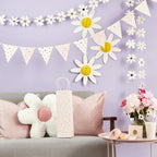 Daisy Days party decorations styled together with hanging garland and tableware