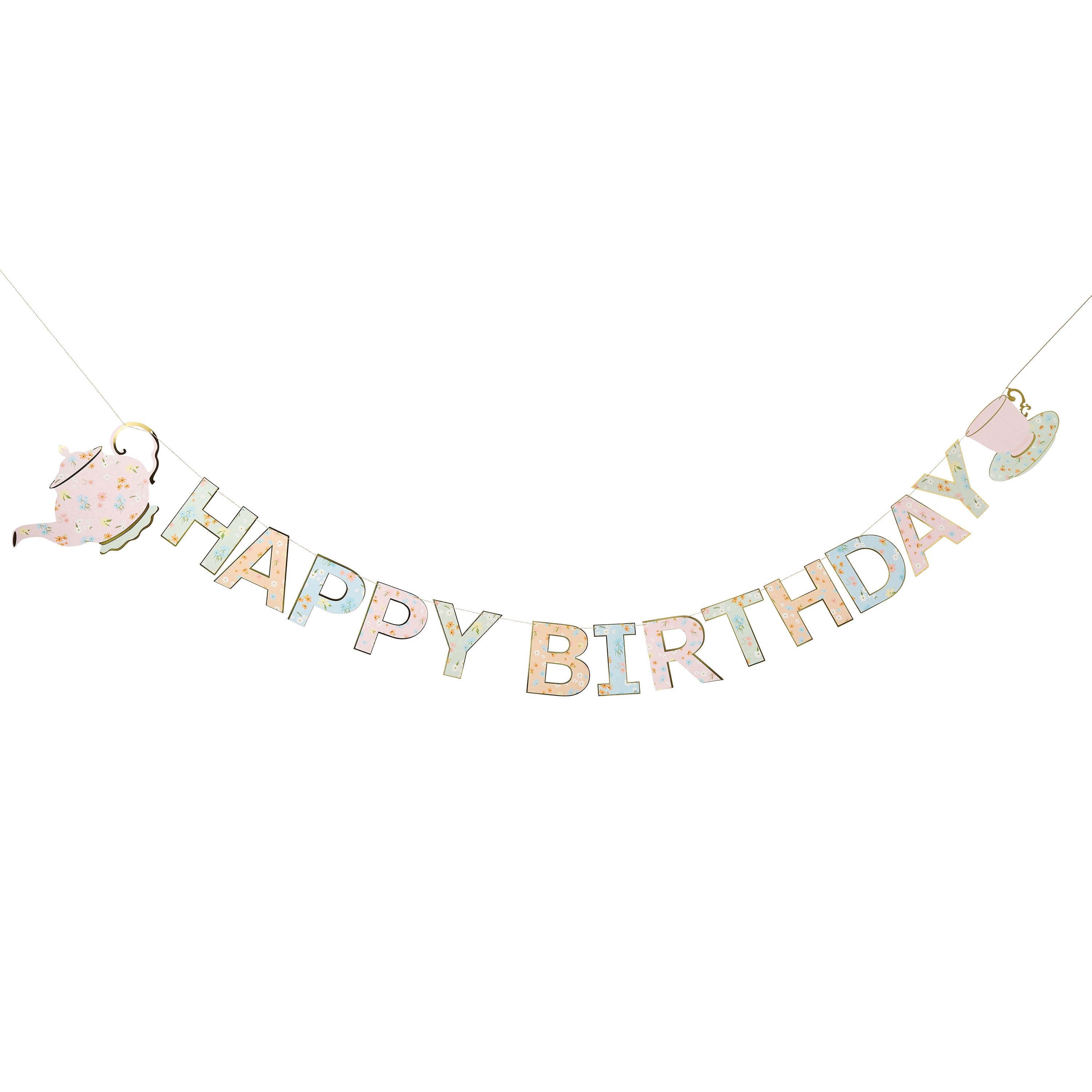 A birthday banner featuring garden tea party motifs such as teacups, flowers, and cakes.