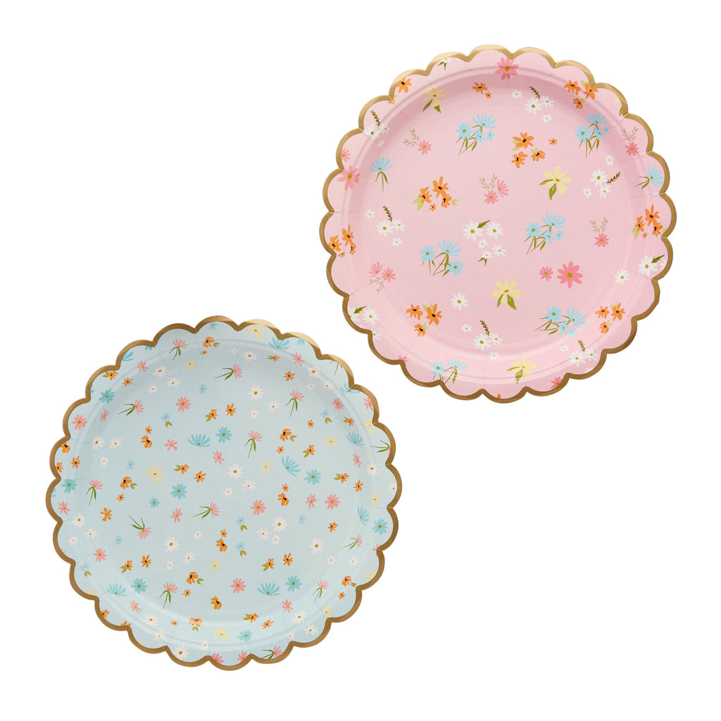 A set of 8 scalloped-edge plates with a floral garden design, perfect for serving food at a tea party.