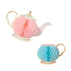 Two honeycomb-style paper decorations in vibrant colors, ideal for adding charm to any garden tea party setting.