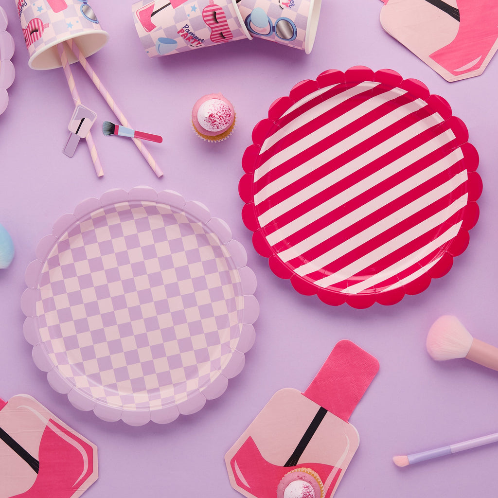 Pamper Party plates detail showing striped and checkered beauty themed designs and products