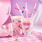Pamper Party makeup straws styled in drinks at a spa-themed kids’ party.