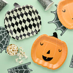 Monster Mob pumpkin shaped paper plates detail showing jack-o-lantern and checkered designs