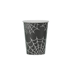 Black paper cup with white spider web pattern on a white background