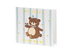 Birthday card with a bear illustration and 'My First Birthday' text on a striped background