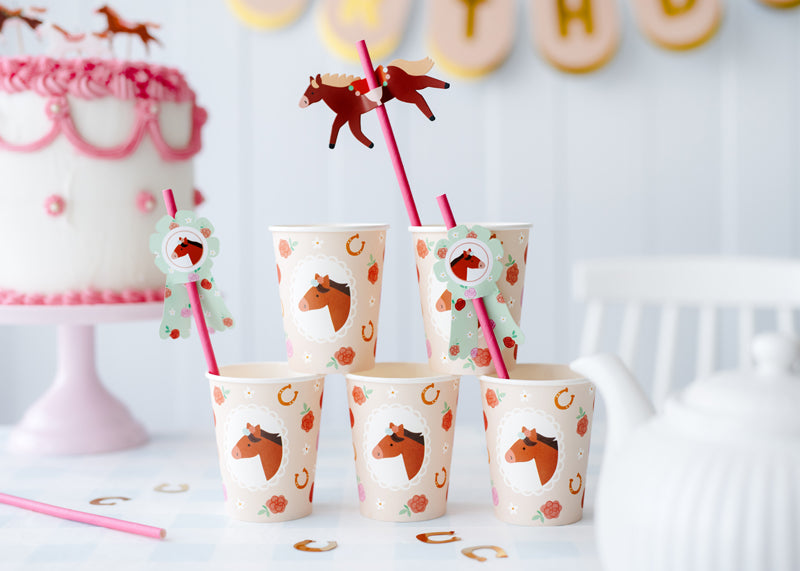 Pink Pony Club cups styled at a whimsical pony-themed party table.