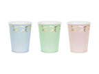 A set of 6 paper cups with a dainty bow motif, great for serving drinks at a magical party.