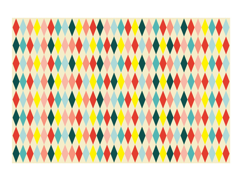 A diamond-patterned tablecloth in bright circus colors, perfect for adding a whimsical touch to your party.