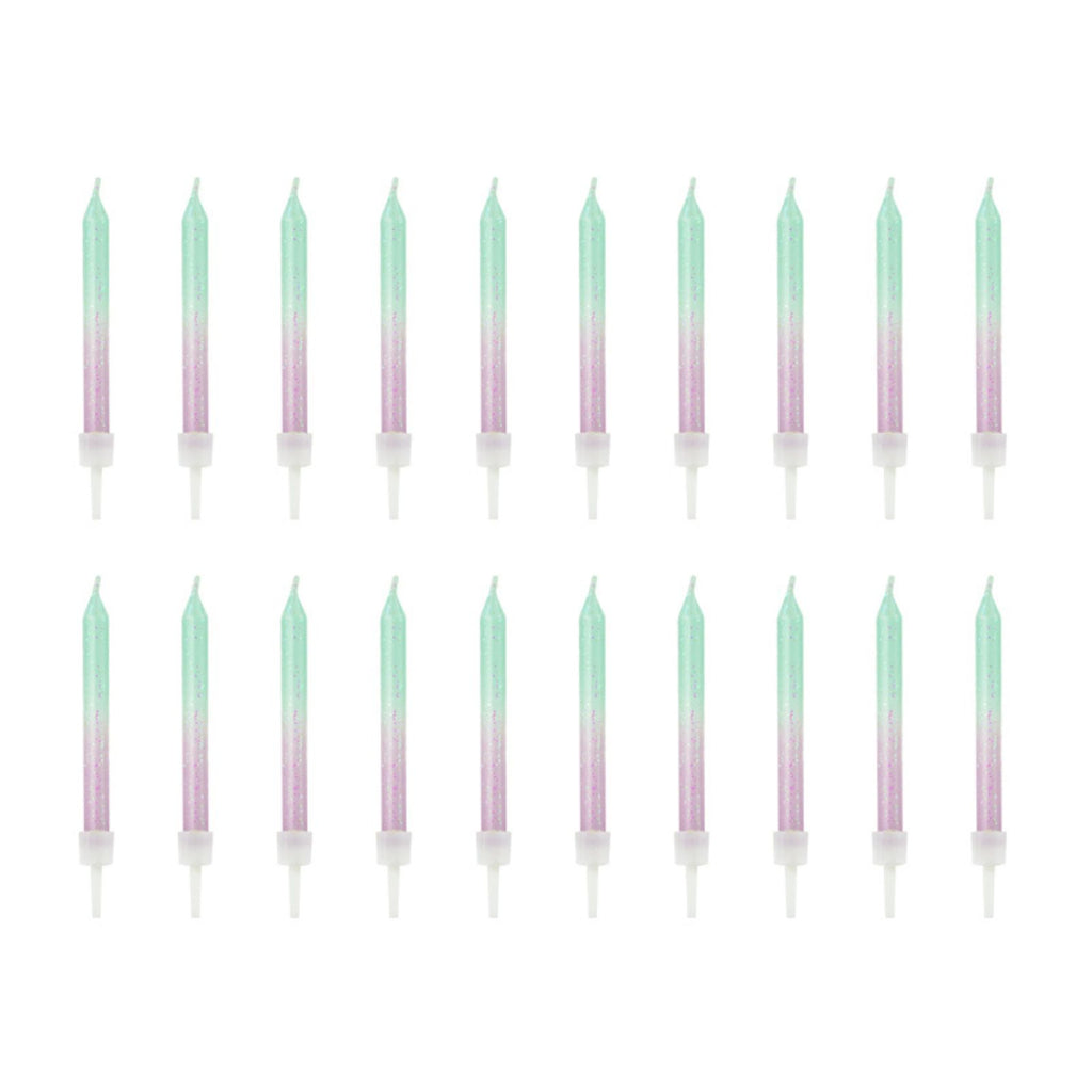 A set of 20 ombré-colored candles in oceanic shades, ideal for birthday cakes with a coastal theme.