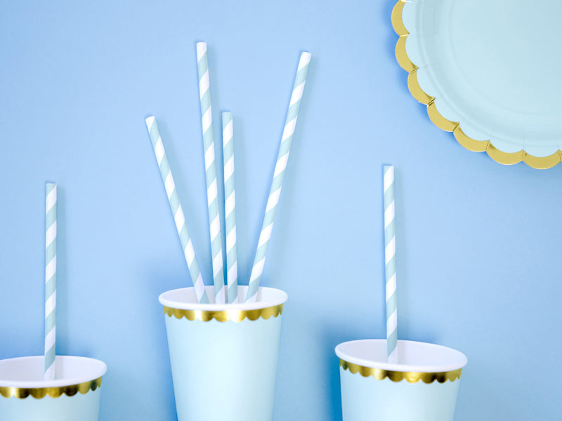 Light blue striped paper straws styled in drinks at a soft pastel party.