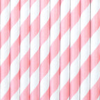 Pattern of pink and white diagonal stripes on a striped background