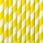 Yellow and white striped straws arranged in a pattern.