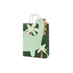 A single gift bag with fun dino graphics, perfect for party favors or birthday presents.