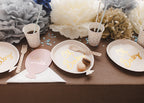Oh Sweet Baby balloon paper plates styled at baby shower party table